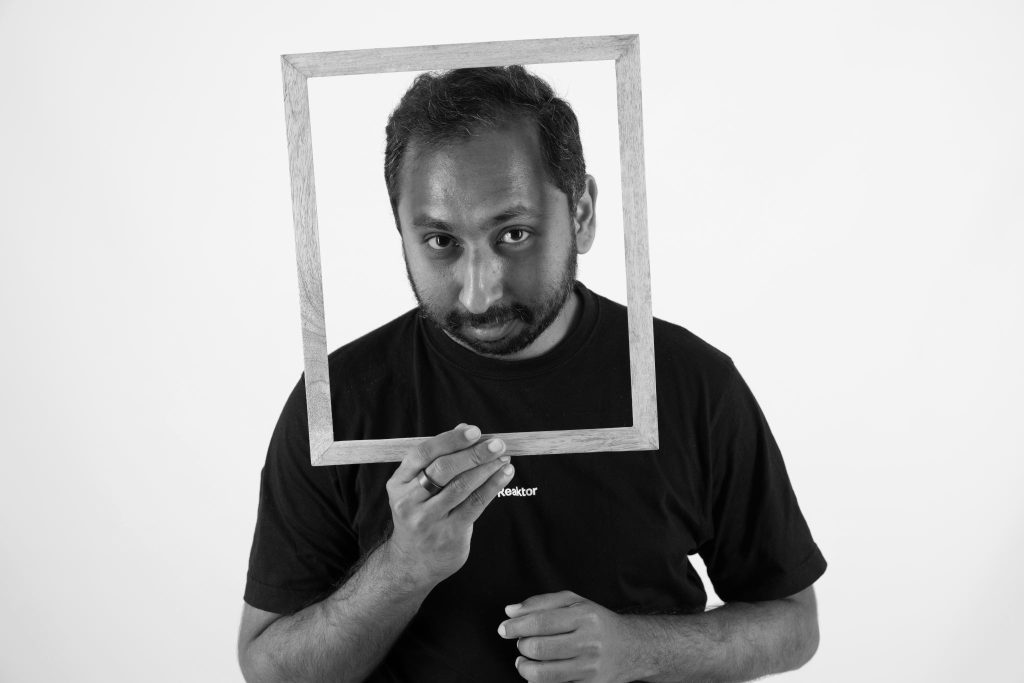 Binny Holding a frame