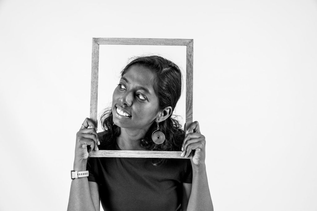 Woman holding a frame